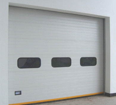 acheter Porte industrielle sectionnelle à levage rapide 380V moteur 26DB isolation acoustique online manufacture