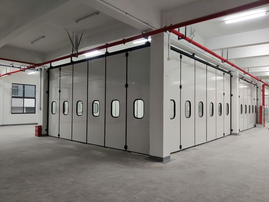 Portes pliantes grises sur mesure sans moteur avec charnières en fonte