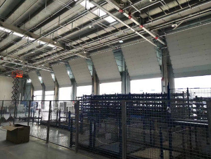 Portes supérieures sectionnelles à rouleaux pour entrepôt ou usine