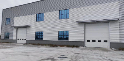 Portes sectionnelles haut de gamme pour une isolation et une sécurité améliorées